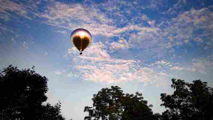 A Giant, Mirrored Hot Air Balloon Is Currently Traveling Over Massachusetts